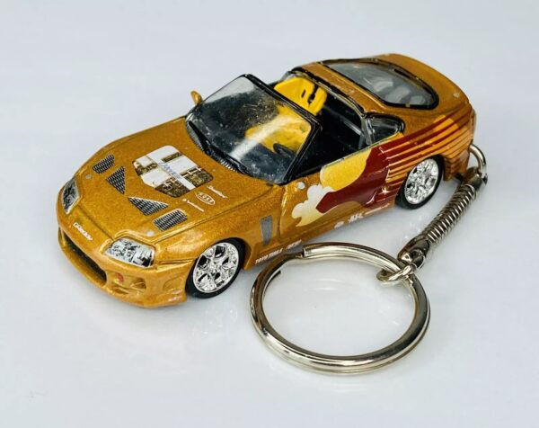 2004 Racing Champions 2 Fast 2 Furious Gold 1995 Toyota Supra 1:64 Keychain